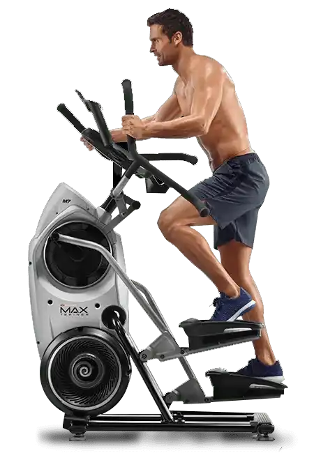 Man using an elliptical machine for cardio exercise
